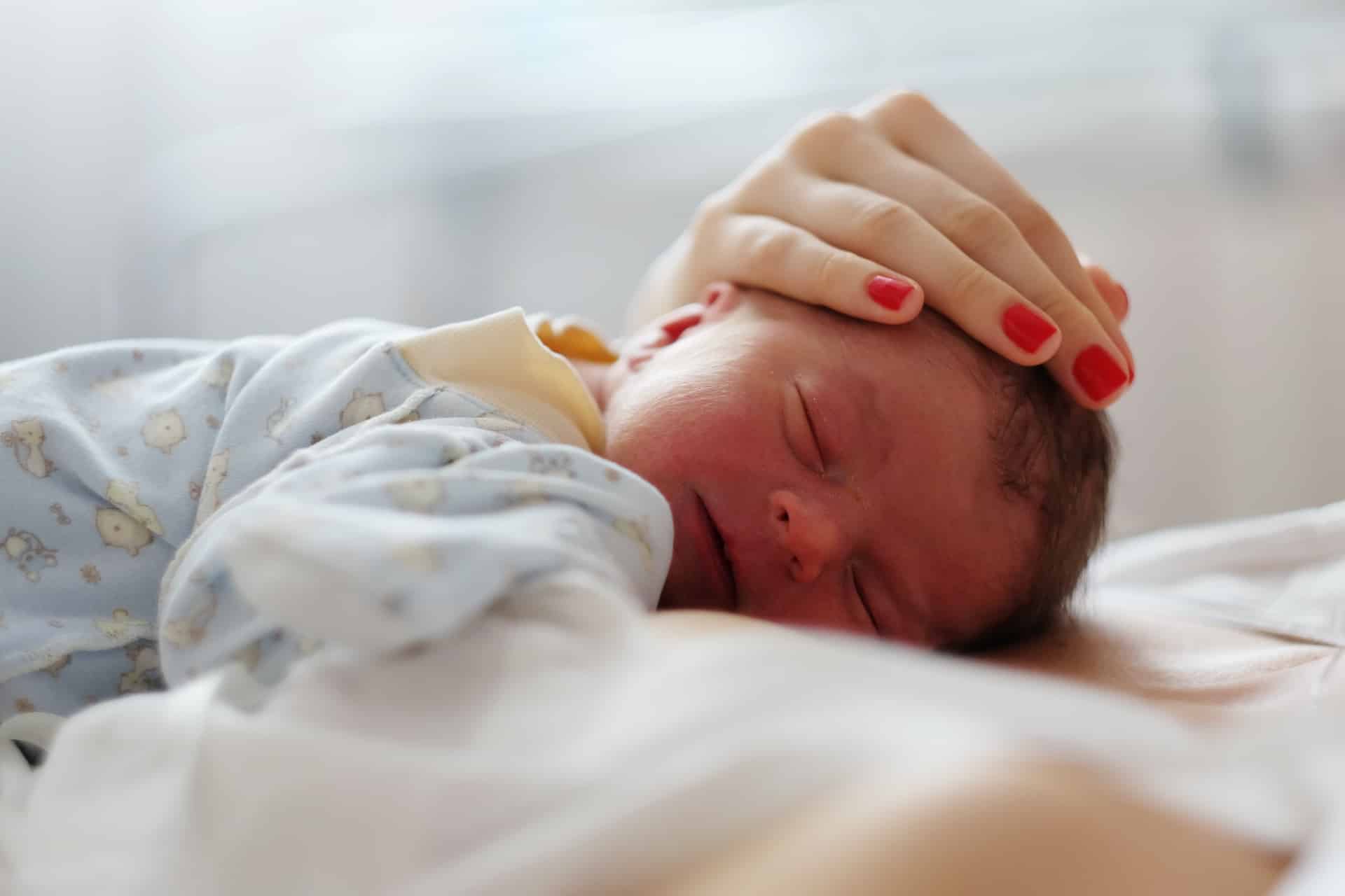 One day old newborn baby with mother Have a baby in the USA