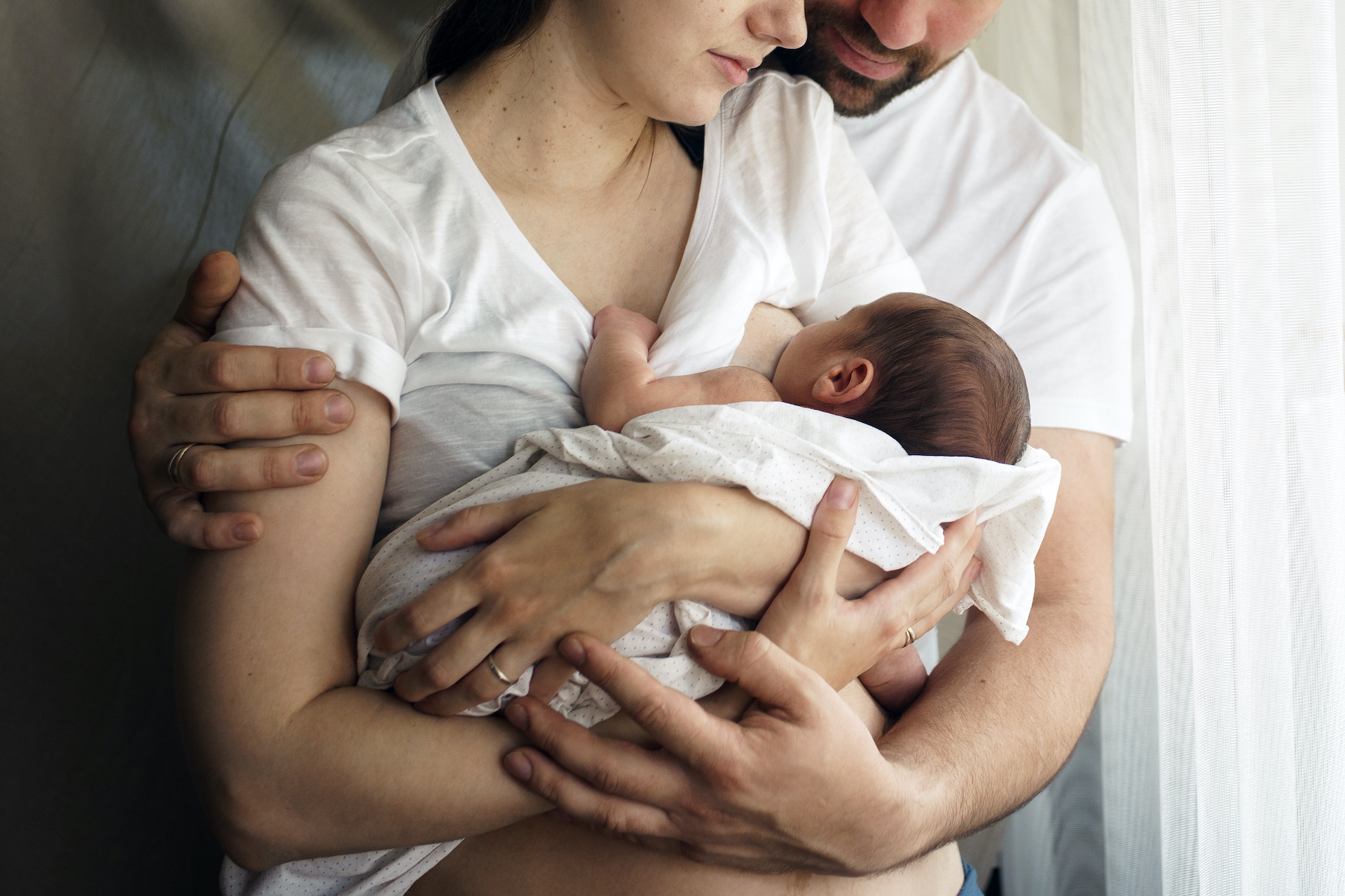 Father and mother with a newborn son. New young multi-generation family Birth Tourism